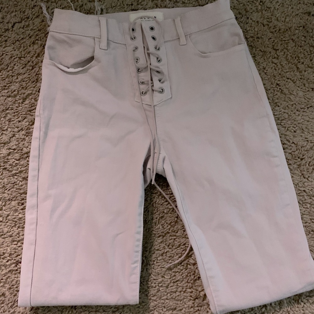 Baby pink high rise lace up jeans